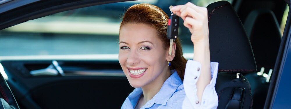 Holding Up Car Keys