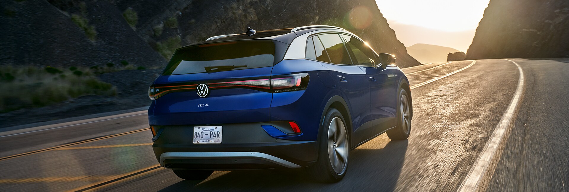 Performance features of the 2021 ID.4 at West Broad Volkswagen of Richmond |2021 ID 4 driving out of mountains into sunset