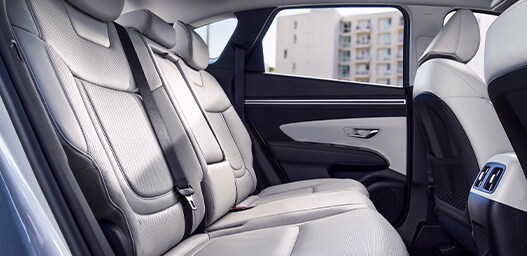 Compare the 2022 Hyundai Tucson vs. the 2021 Honda CR-V at West Broad Hyundai | Tucson's backseats