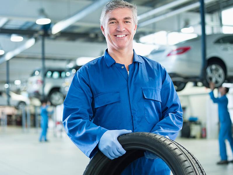 man holding tire.jpg
