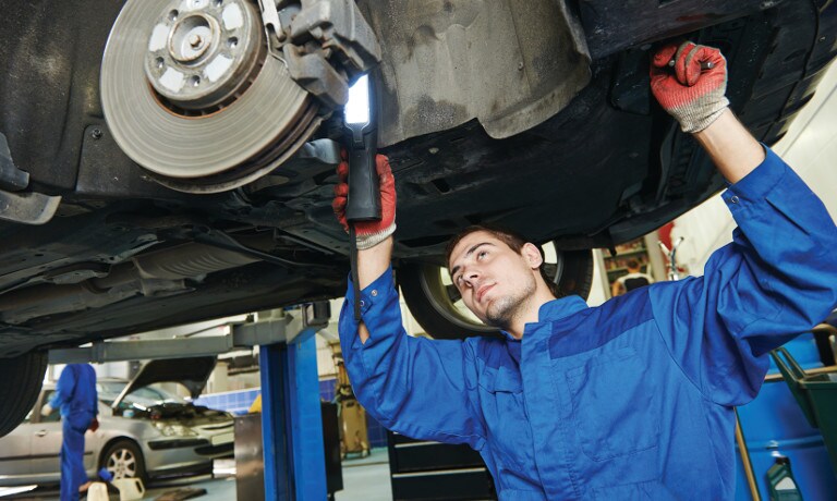 Mechanic fixing brakes Mechanic fixing brakes