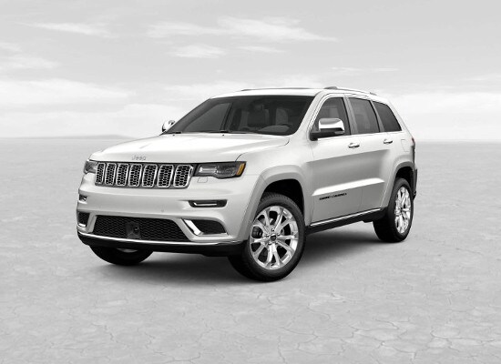 A white 2019 Jeep Grand Cherokee Summit