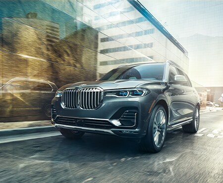 Black BMW X7 Driving in City