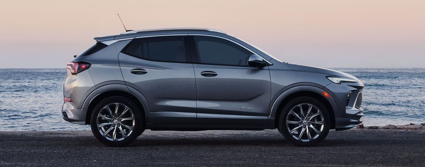 A silver 2025 Buick Encore GX from the side.