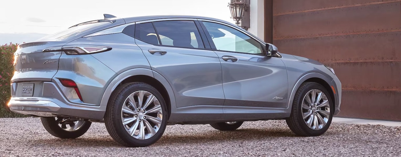 A silver 2024 Buick Envista from the side.