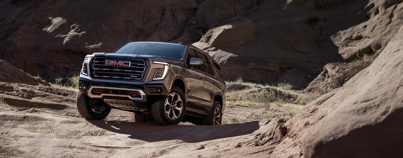 A grey 2025 GMC Yukon from the front after leaving one of the GMC dealers in Columbia.