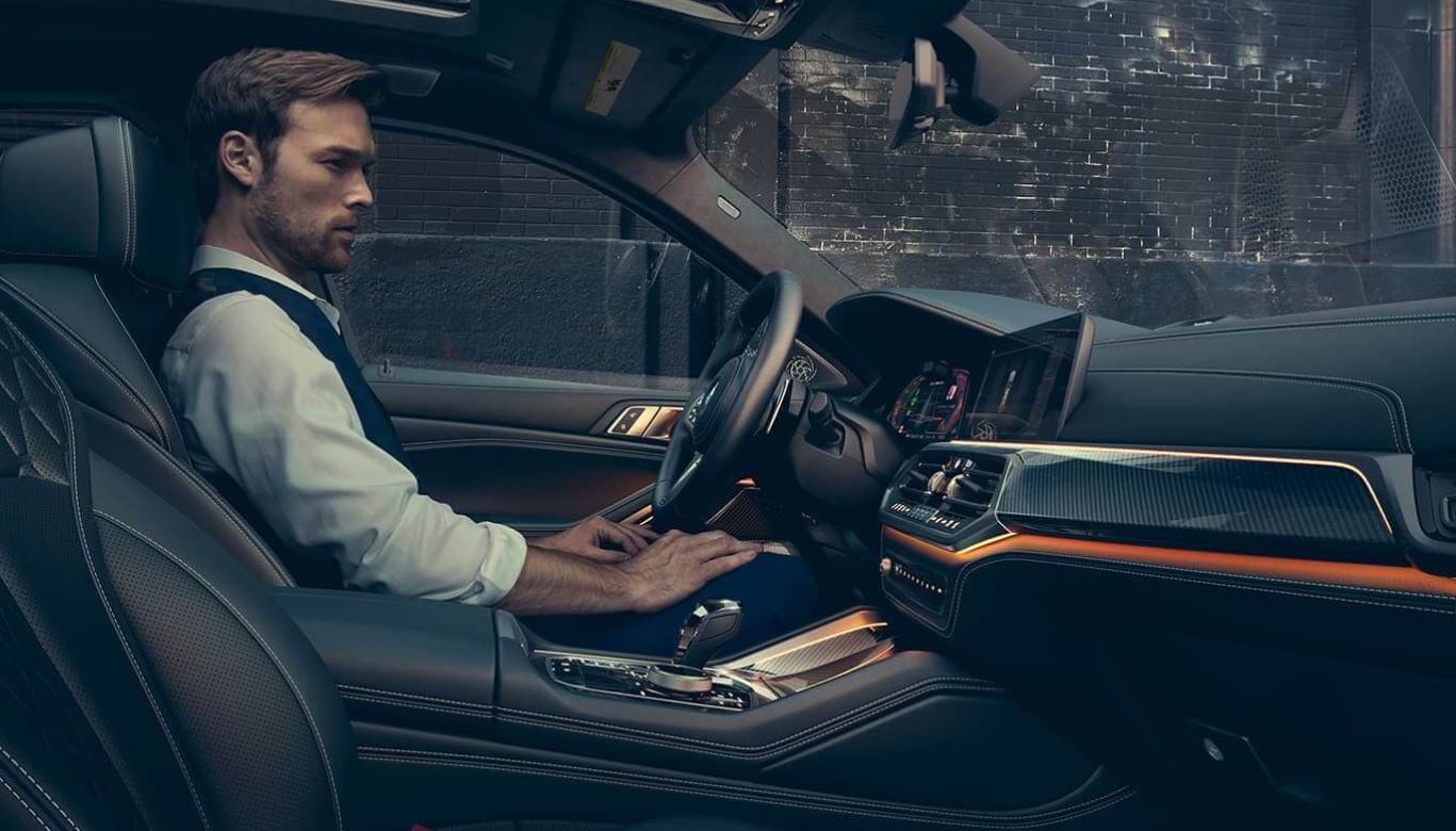2021-bmw-x6-man-in-car.JPG