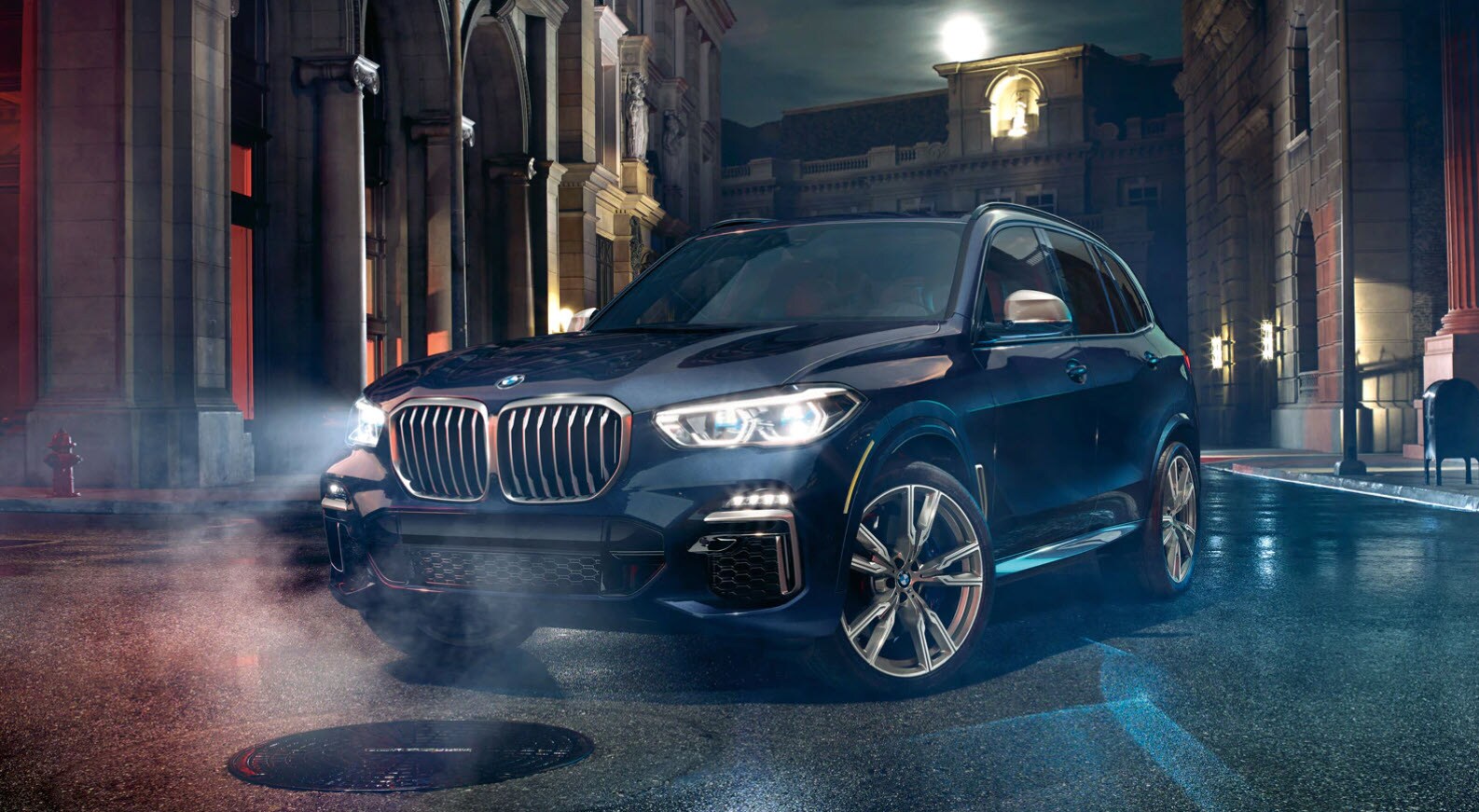 BLUE X5 PARKED IN THE STREET.jpg