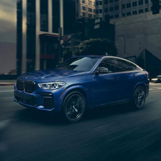 2022-bmw-x6-blue-driving.JPG