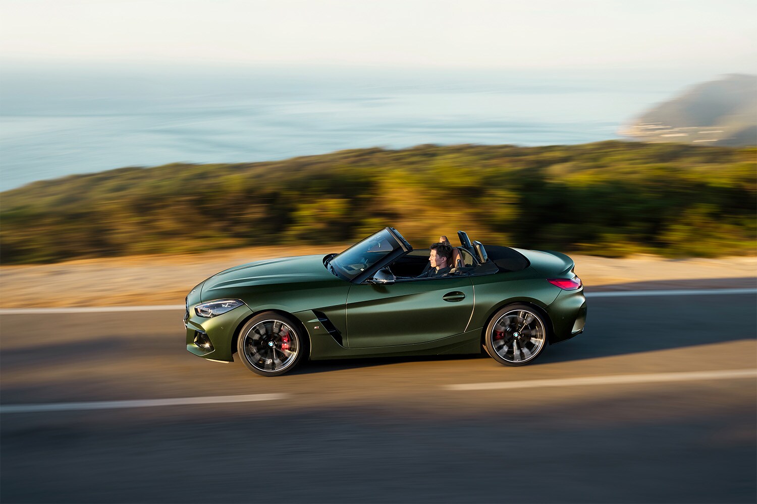 2026 BMW Z4 with the top down, embracing open-air freedom and exhilarating performance.