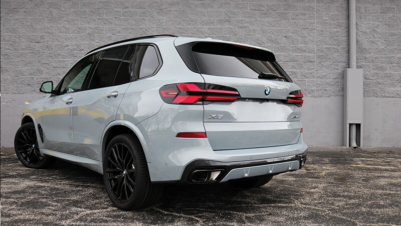BMW X5 Dynamic Damper Control system illustrating adjustable suspension settings for enhanced ride comfort and performance, featured at Patrick BMW in Schaumburg, IL.