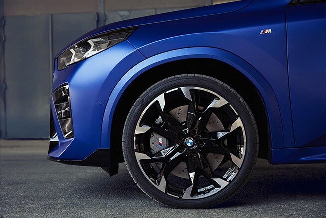Close-up of the sleek and stylish BMW X2 wheels, showcasing its dynamic design and performance-oriented look.