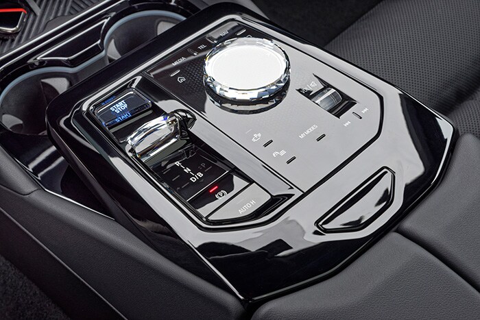 BMW i5 glass controls featuring a sleek, modern design for a premium driving experience.