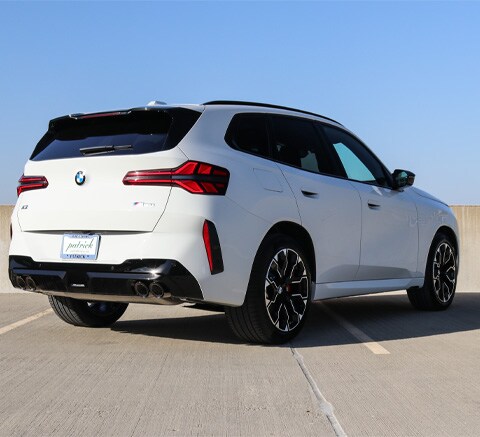 2026 BMW X3 luxury SUV at Patrick BMW in Schaumburg, IL, featuring sleek exterior design, aerodynamic lines, and premium styling.