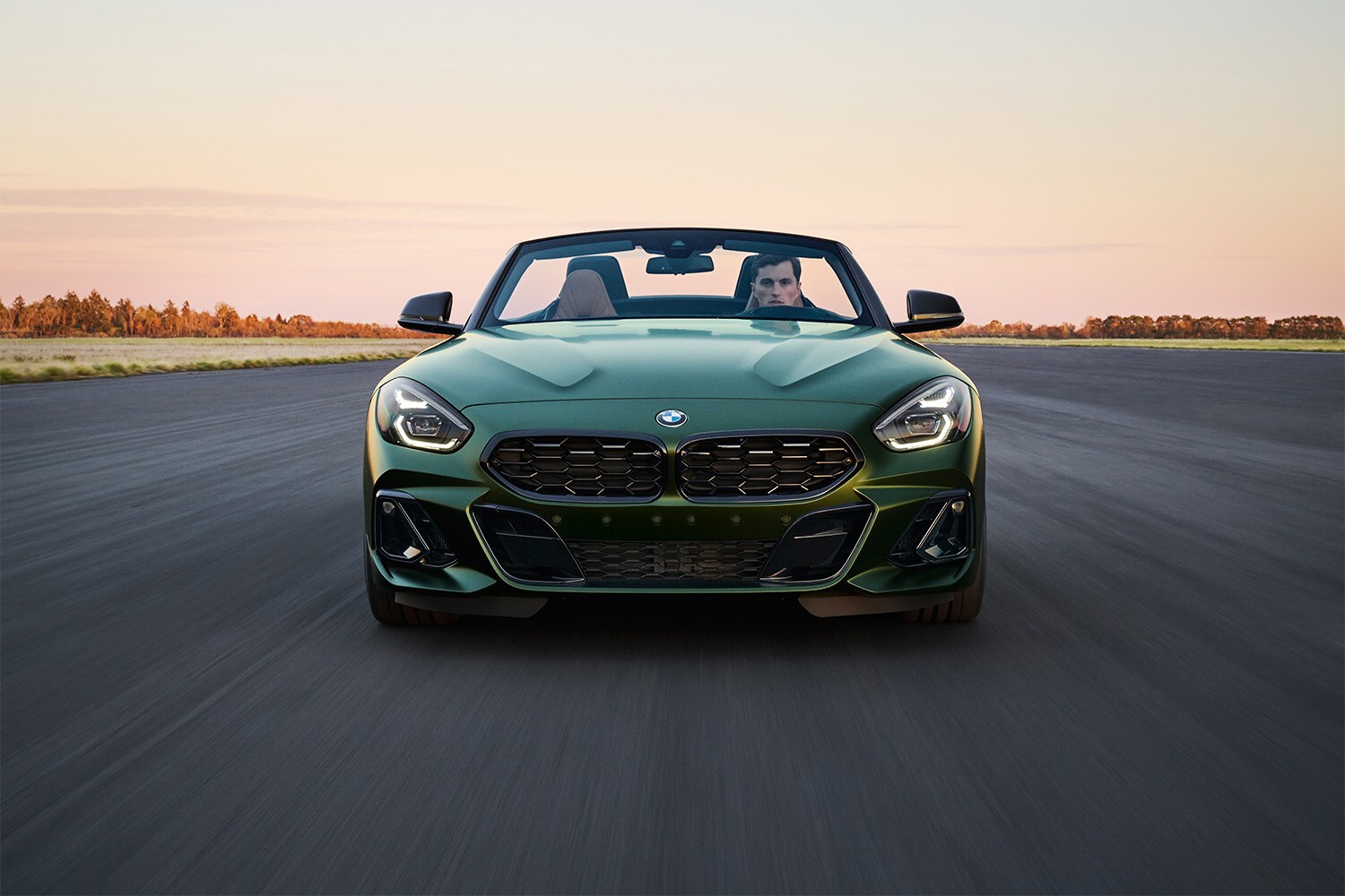 2026 BMW Z4 showcasing its sleek, aerodynamic design with sharp lines and dynamic curves.