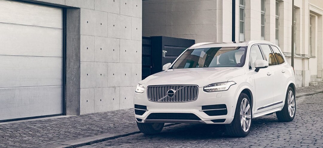 2018 volvo xc90 parked in front of garage