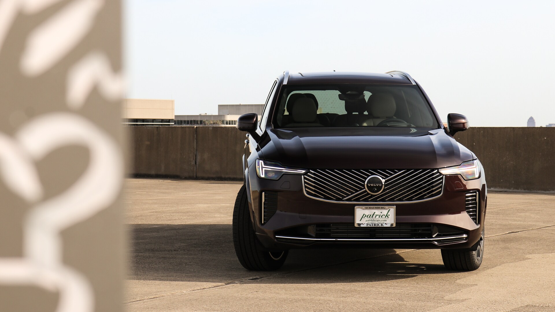 Interior and technology features of the 2025.5 Volvo XC90 Plug-In Hybrid, including a panoramic display, premium leather seats, and advanced driver-assist systems
