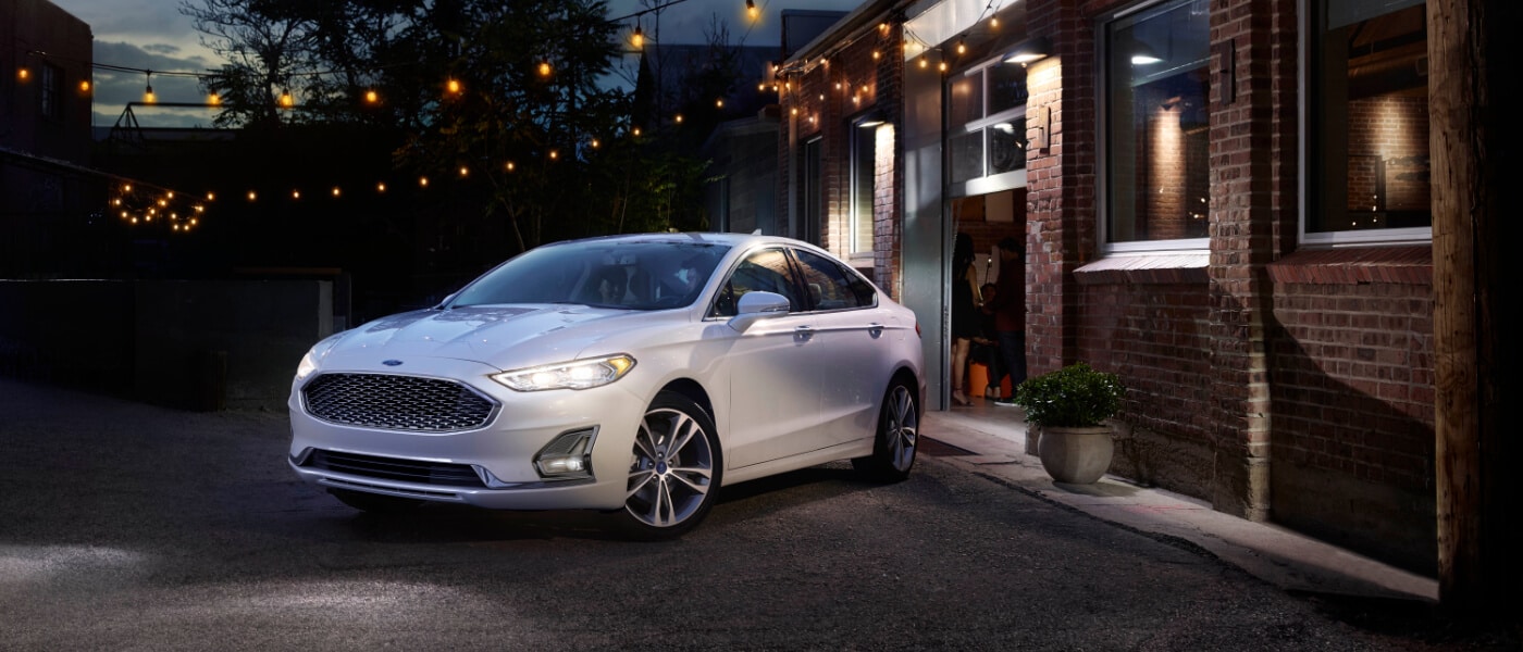 2020 Ford Fusion parked outside a house