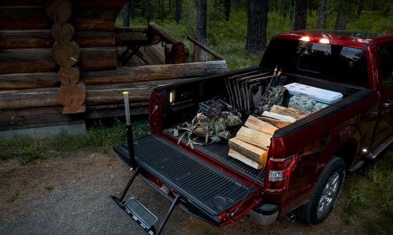 2020 Ford F-150 cab bed carrying wood and supplies