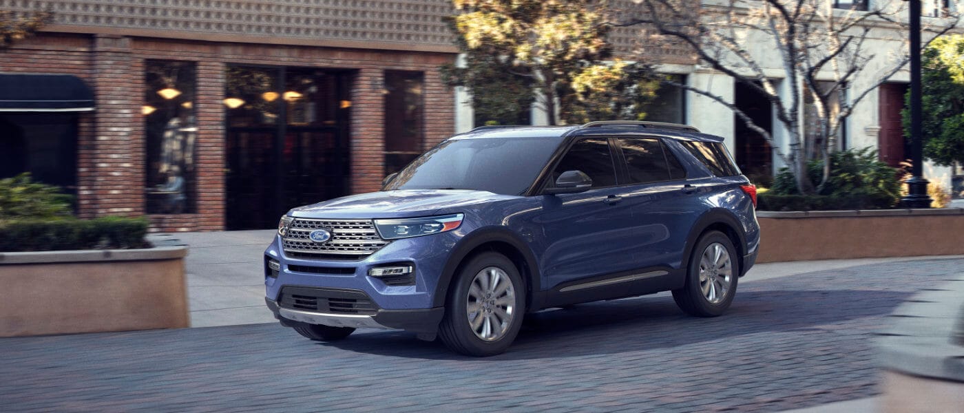 2020 Ford Explorer driving down the street