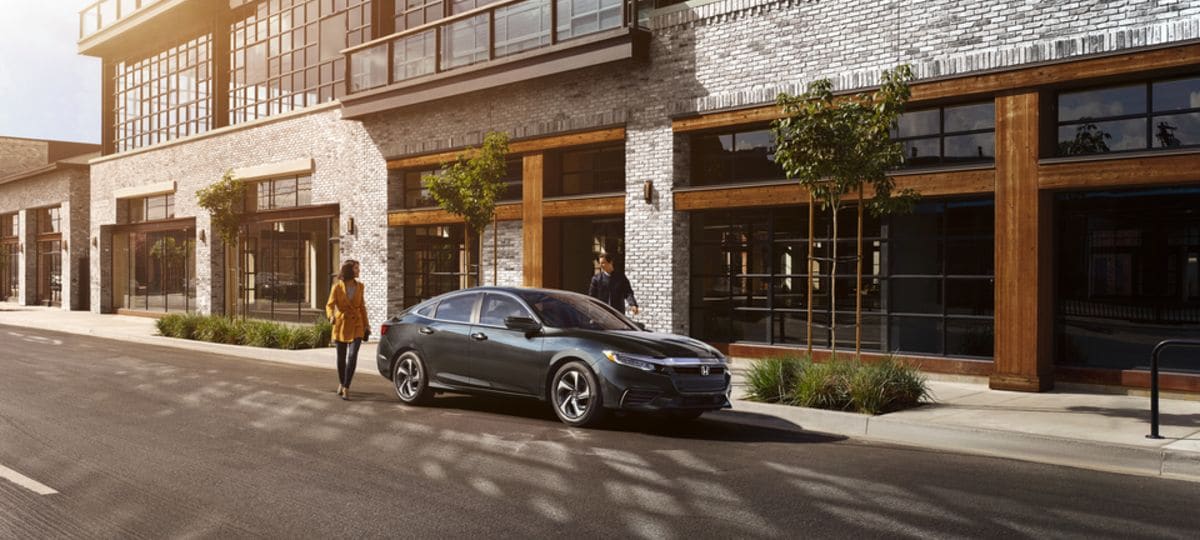 2021-Honda-Insight-EX-Sedan parked by downtown business_res.jpeg
