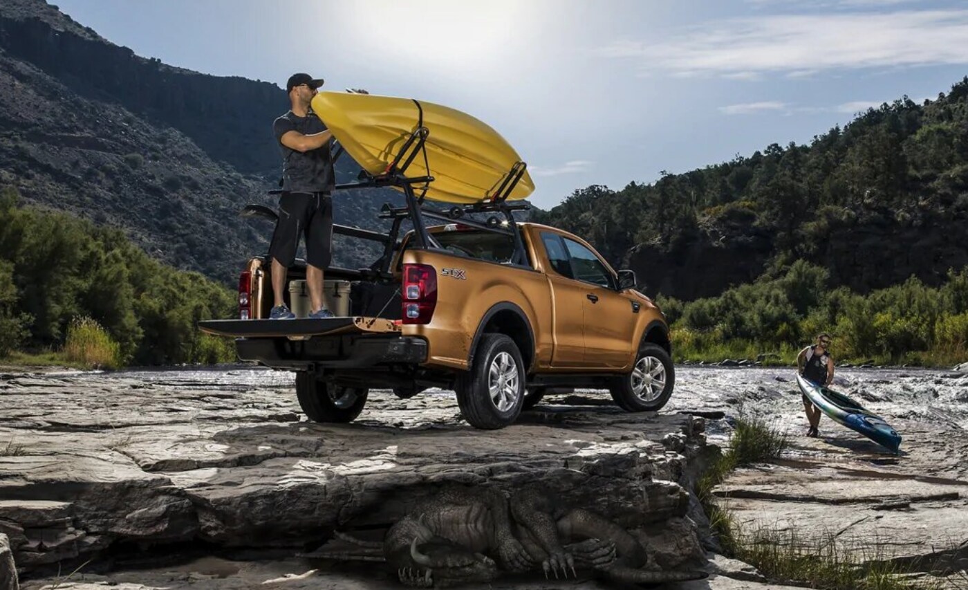 New 2021 Ford Ranger Exterior (2).png New Ford Ranger in orange exterior color with kayaks mounted to racks fitted to the truck bed