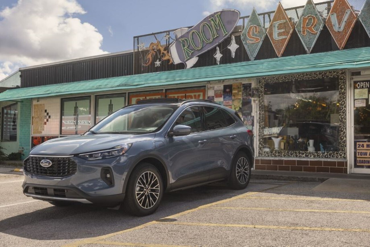 Escape 2024.JPG A Ford Escape parked in front of a small business.