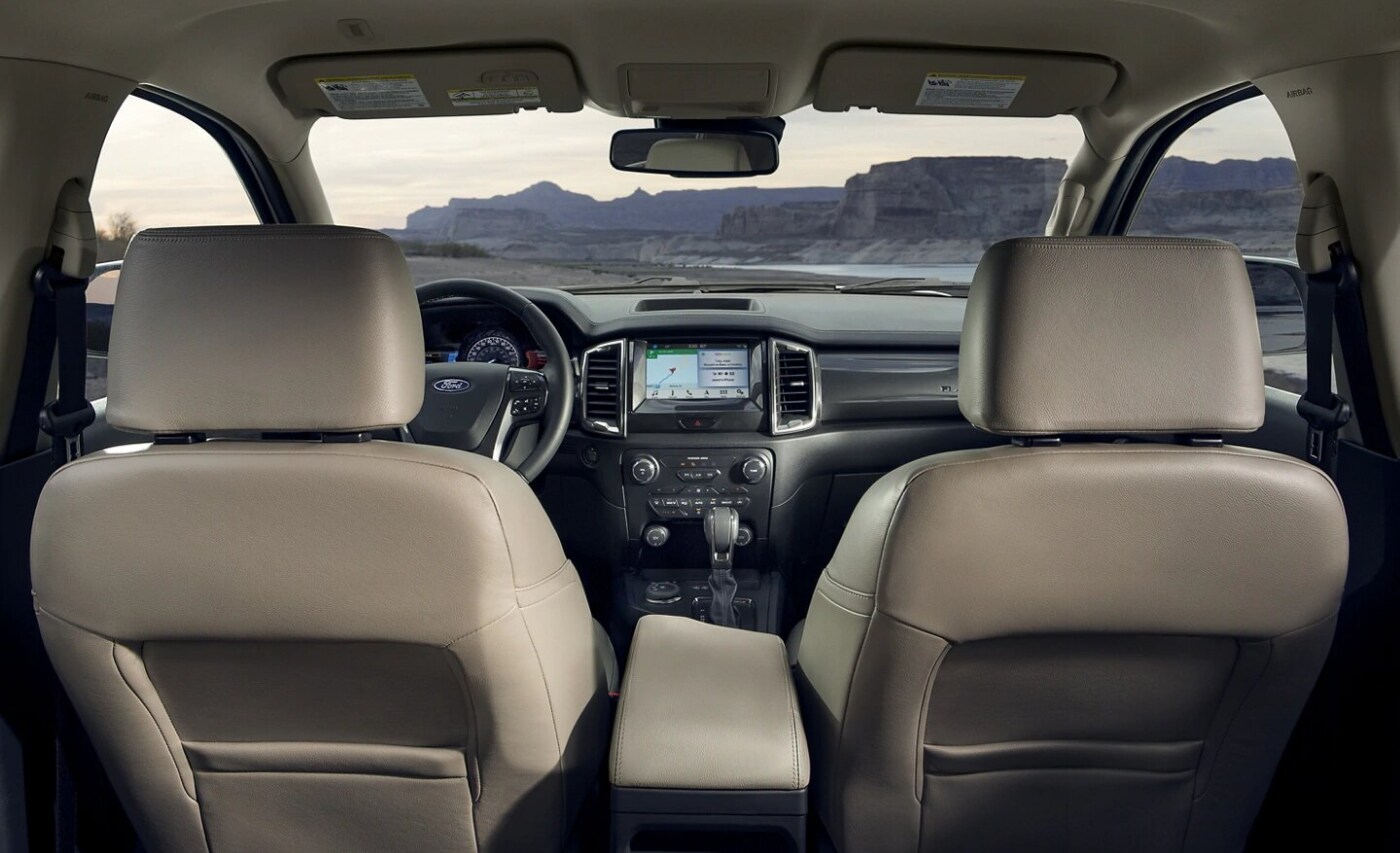 New 2021 Ford Ranger Interior.png Interior design view of the new Ford Ranger Lariat as seen from the back seat