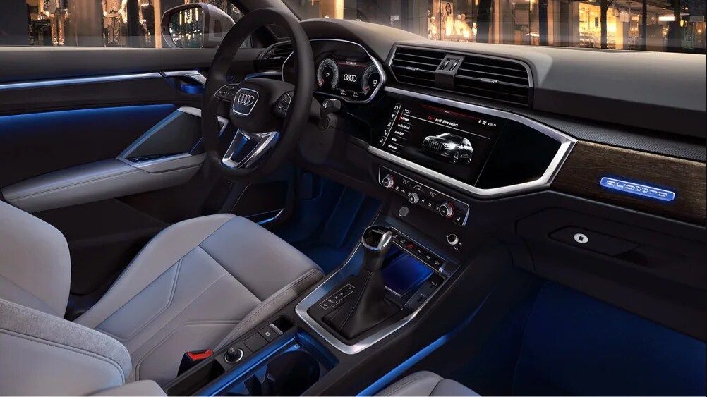 2022 Audi Q3 Interior 1.png The interior of a 2022 Audi Q3, Showing the Steering Wheel, Dashboard, and Infotainment System