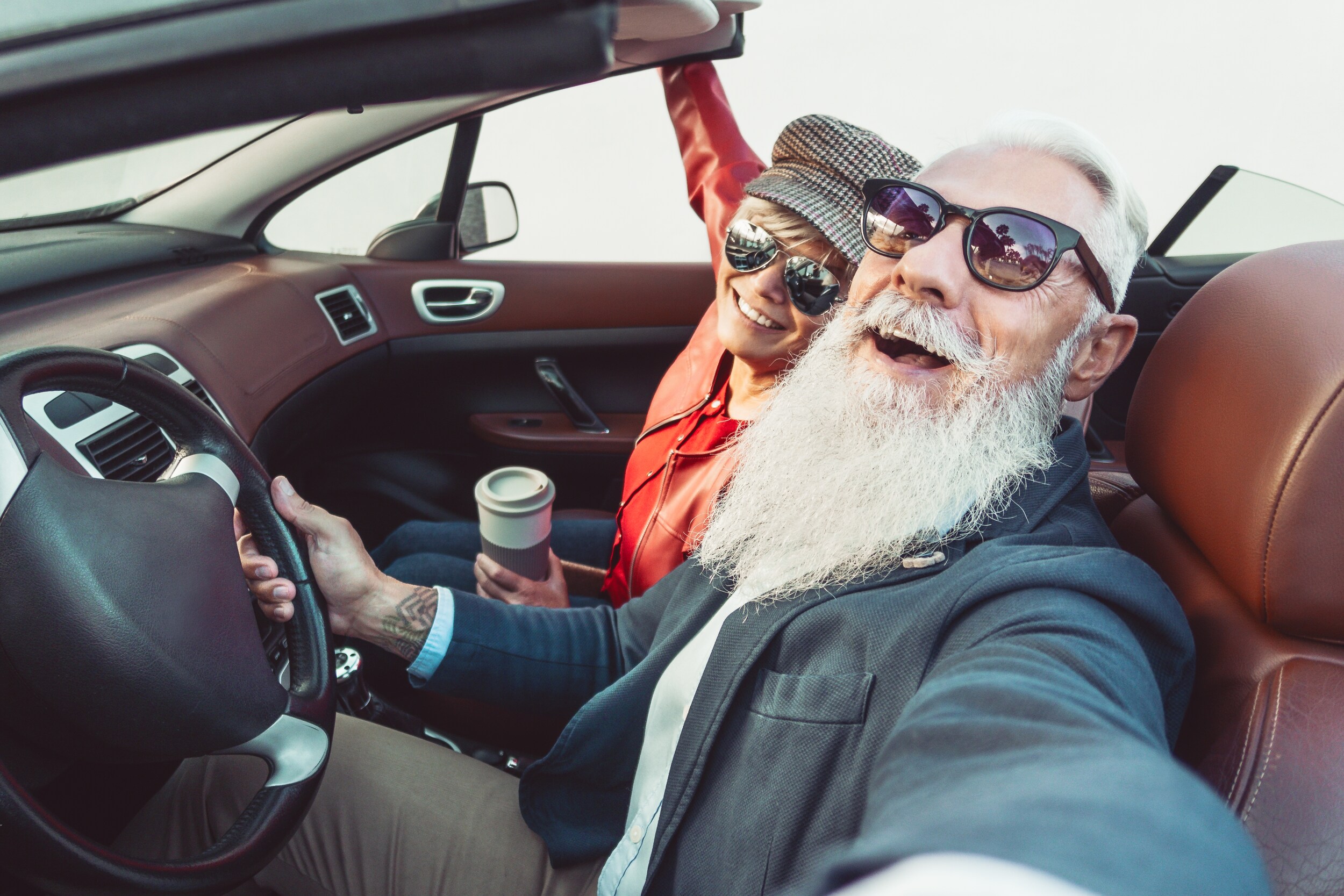 certified-used-cars-phil-long-dealerships.jpg Happy elderly couple sit in a newly purchased classic vehicle and celebrate their happy life together