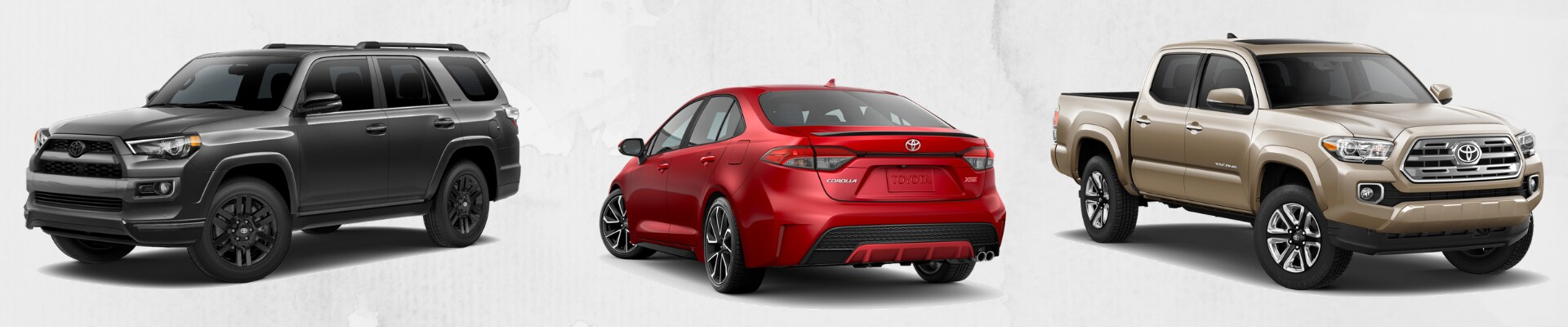 Best used Toyota cars in Colorado at Phil Long Dealerships.png Image of a used dark gray Toyota 4Runner, red Toyota Corolla and a gold Toyota Tacoma