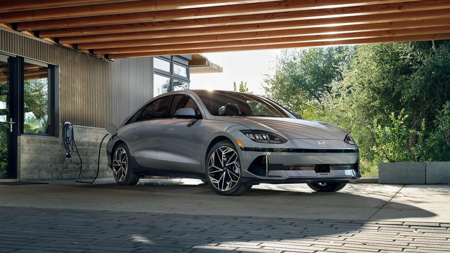 IONIQ6.JPG A new Hyundai IONIQ 6 changing outside a home.