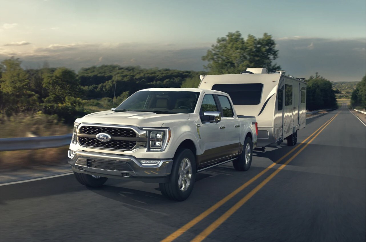 2022-ford-f-150-01.jpg the-all-new-ford-f-150-hauling-a-large-fifth-wheel-camper