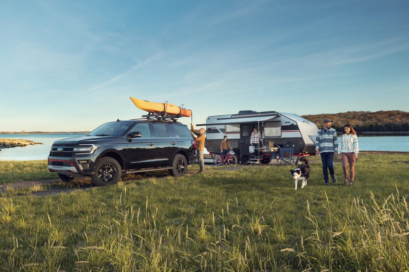 2023-Ford-Expedition-2.PNG A 2023 Ford Expedition sits parked at a lake hauling equipment