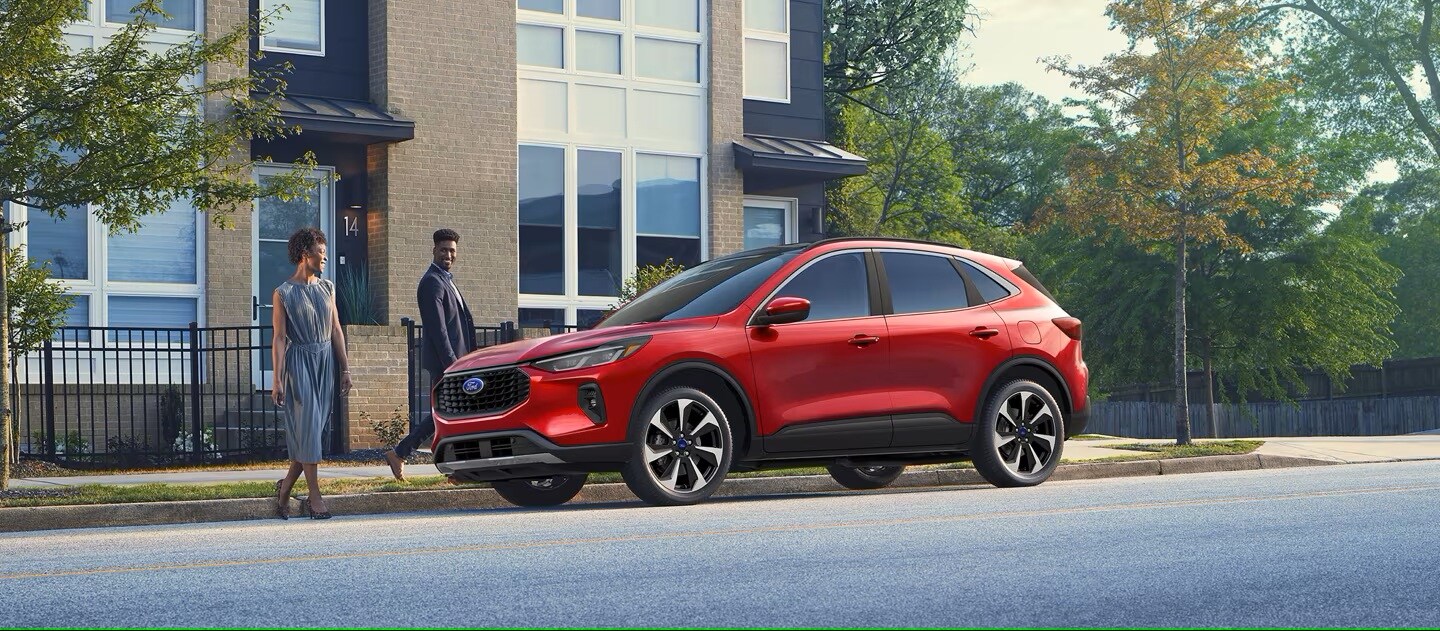 Screenshot%202025-03-18%20203819.png Red 2025 Ford Escape parked on a downtown road.