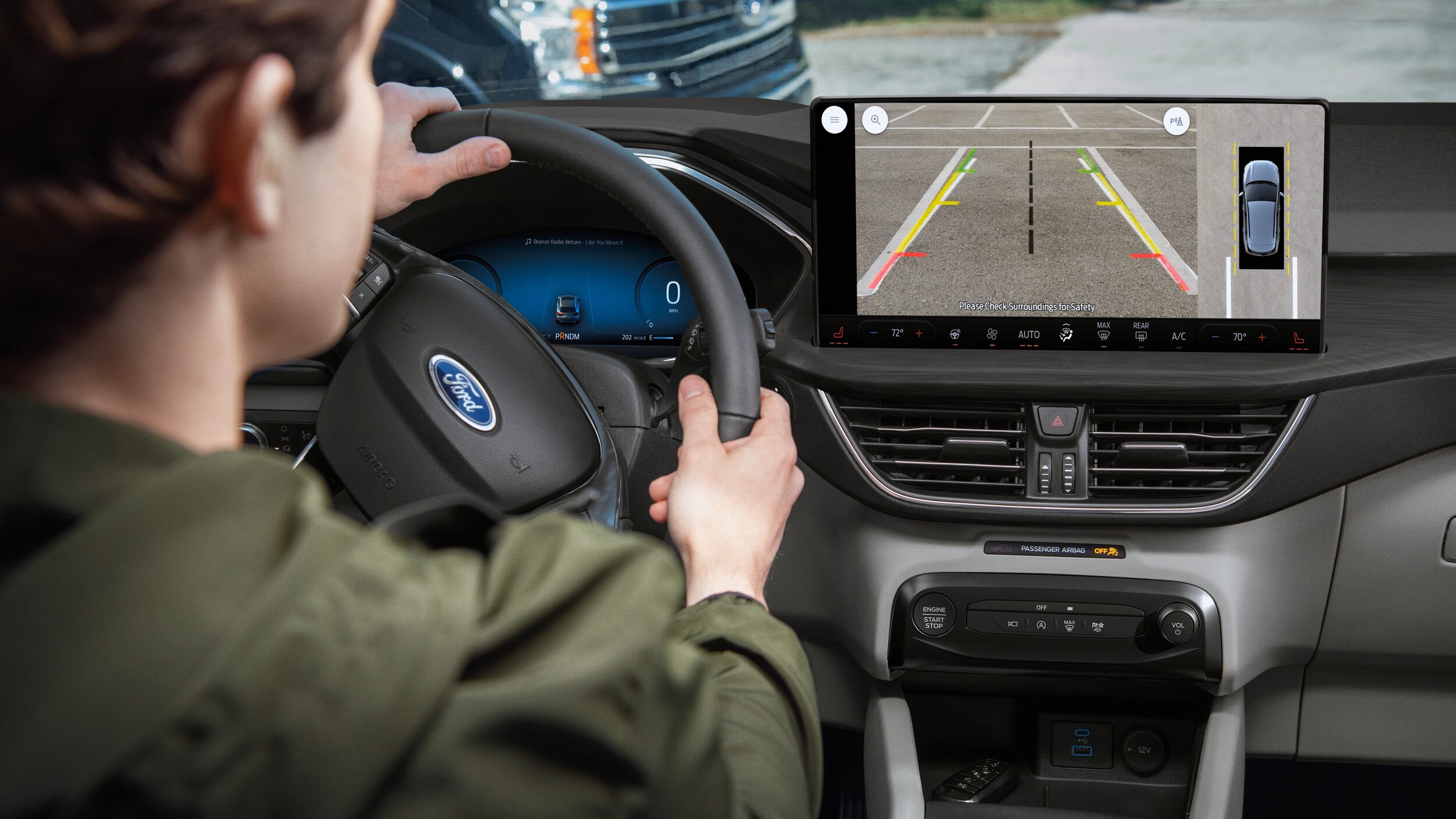 Screenshot%202025-03-18%20203819.png The interior of a 2025 Ford Escape showing the backup camera screen.