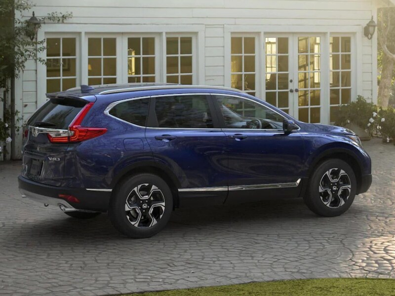 Exterior of a blue 2019 Honda CR-V parked in a driveway