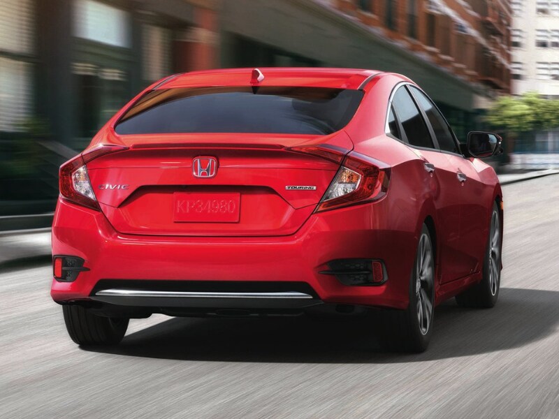 2019 Honda Civic rear exterior view driving down city streets