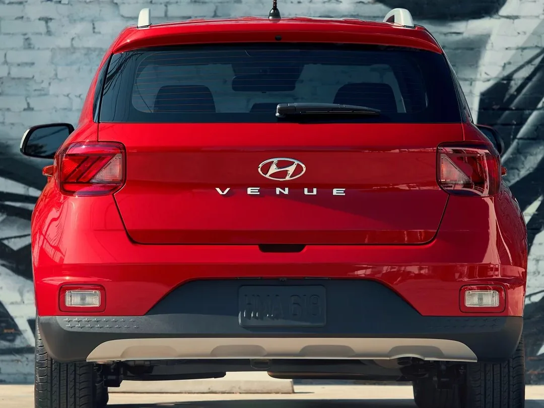 Rear view of a red Hyundai Venue