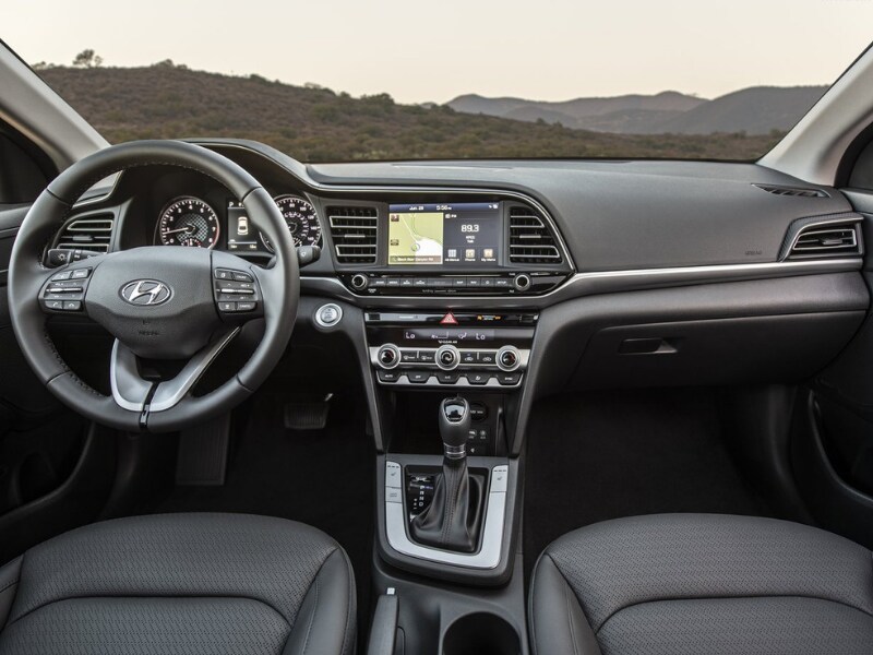 2019 Hyundai Elantra interior front cabin design from view of back seat