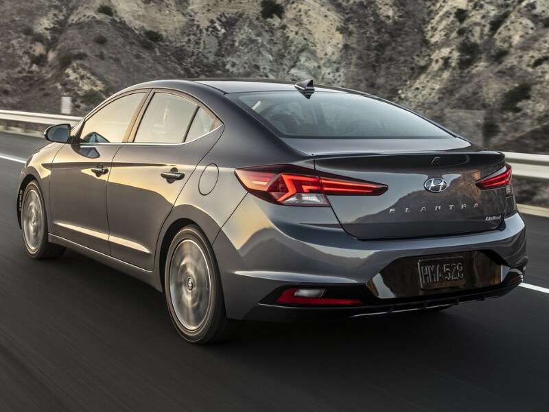 2019 Hyundai Elantra rear exterior view driving down mountain highway