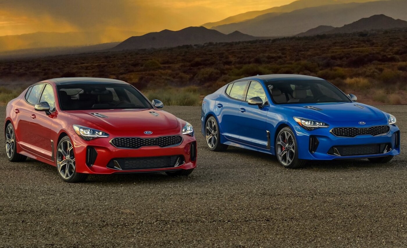 New 2021 Kia Stinger GT2.png New 2021 Kia Stinger models parked side by side one in blue color one in red