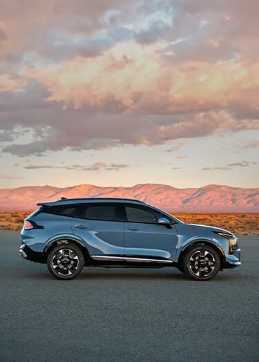 2026 Kia Sportage Parked in Front of Mountains