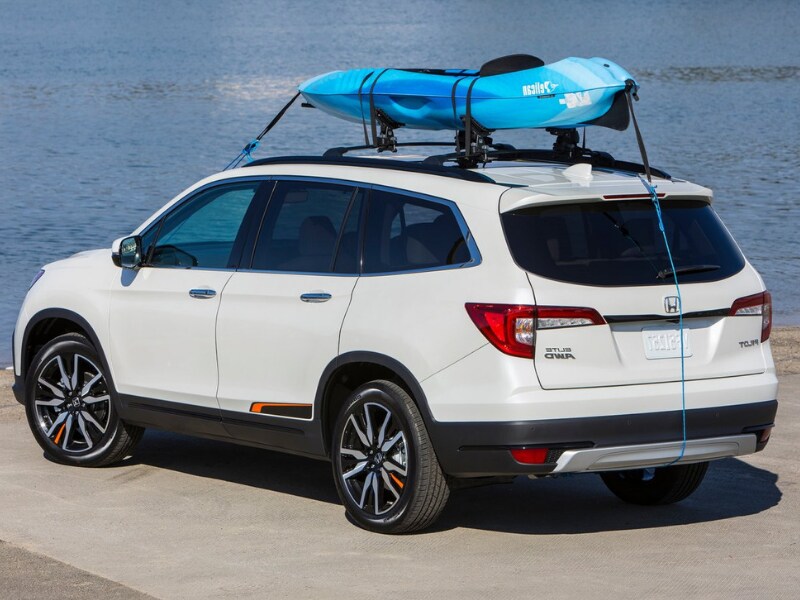 Rear exterior view of a white 2019 Honda Pilot
