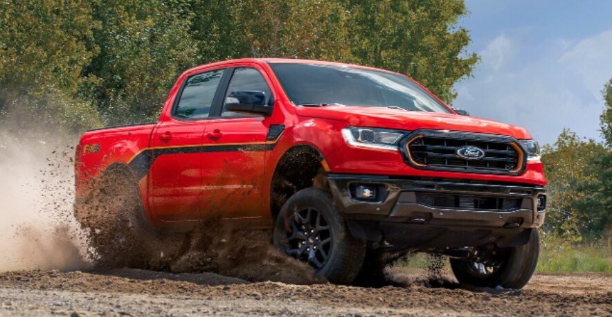 Red Ford Ranger Splash Package.PNG 2023-ford-ranger-splash-package-driving-through-mud