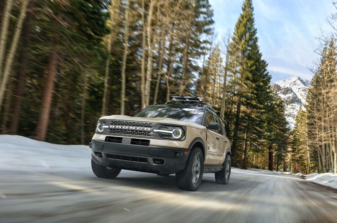 2024-ford-bronco-sport-5.JPG A Ford Bronco Sport driving on a snow packed road.