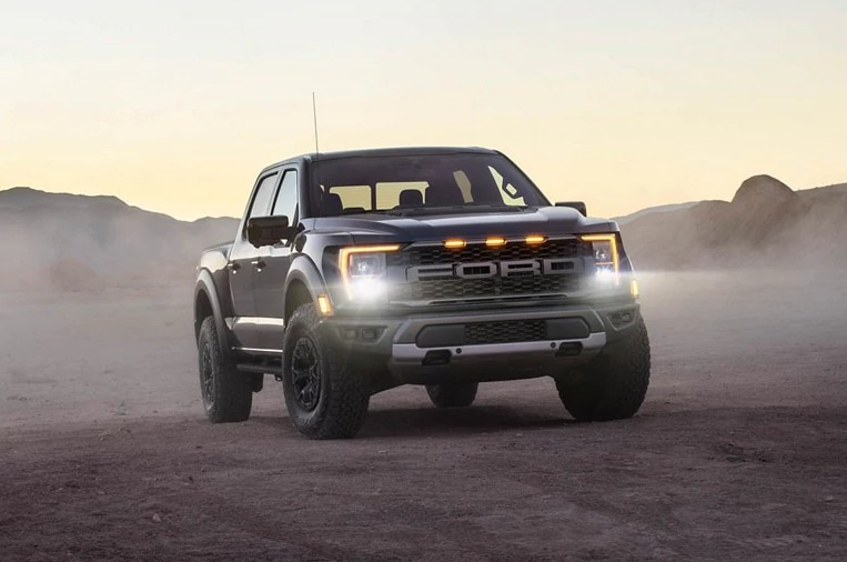 2022-Ford-F150-Raptor-1.PNG new-ford-f150-raptor-parked-on-top-of-a-mountian