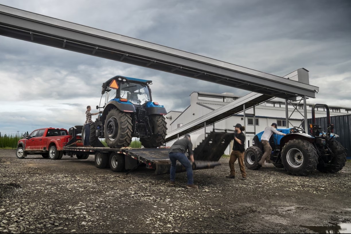 Super%20Duty%202024-07-03%20091857.jpg A Ford F-350 towing a large tractor.