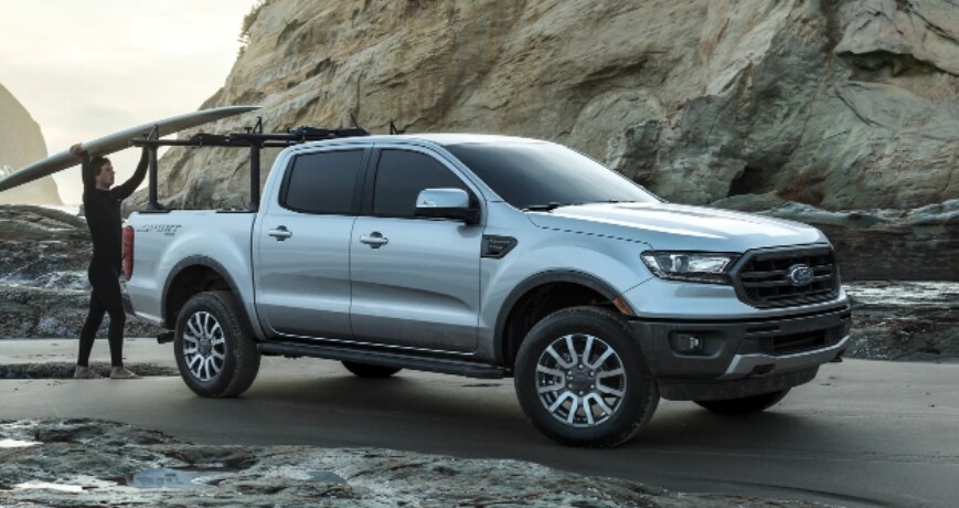 2023 Ford Ranger Silver - Last.PNG man-loading-a-surf-board-into-2023-ford-ranger