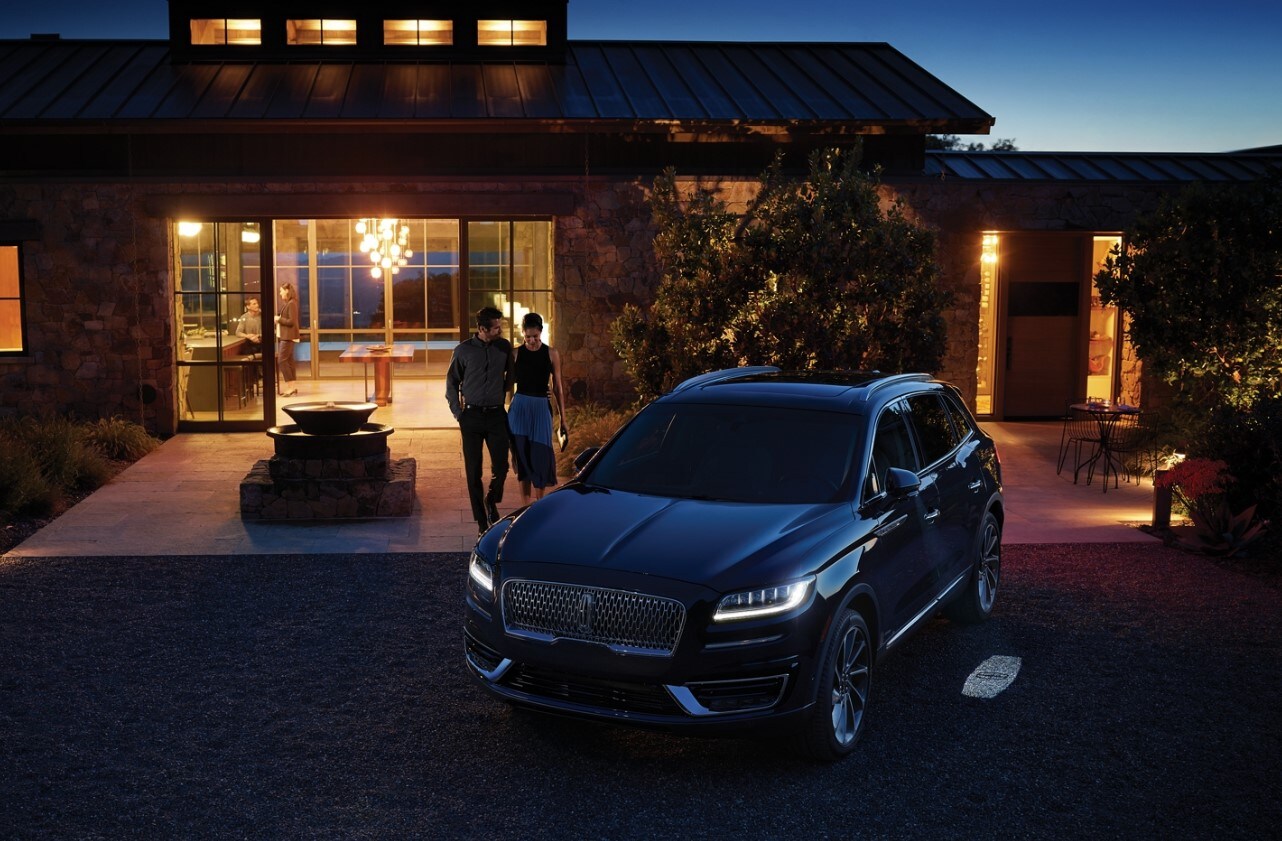 2020-lincoln-nautilus.jpg A 2020 Lincoln Nautilus parked outside an Italian style house in the country at dusk